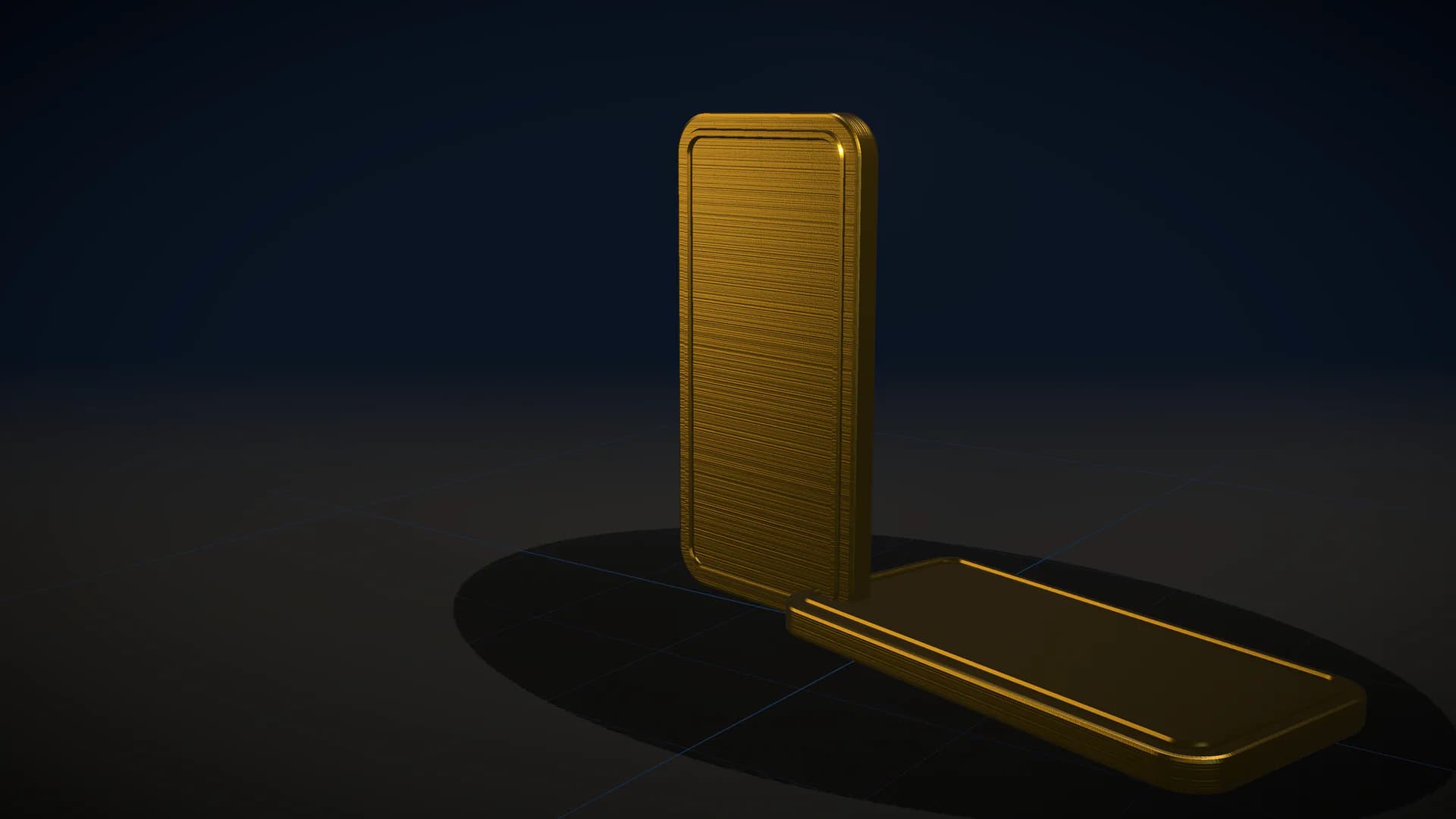 An upright rounded brushed gold slab beside a second slab lying flat on a dark floor