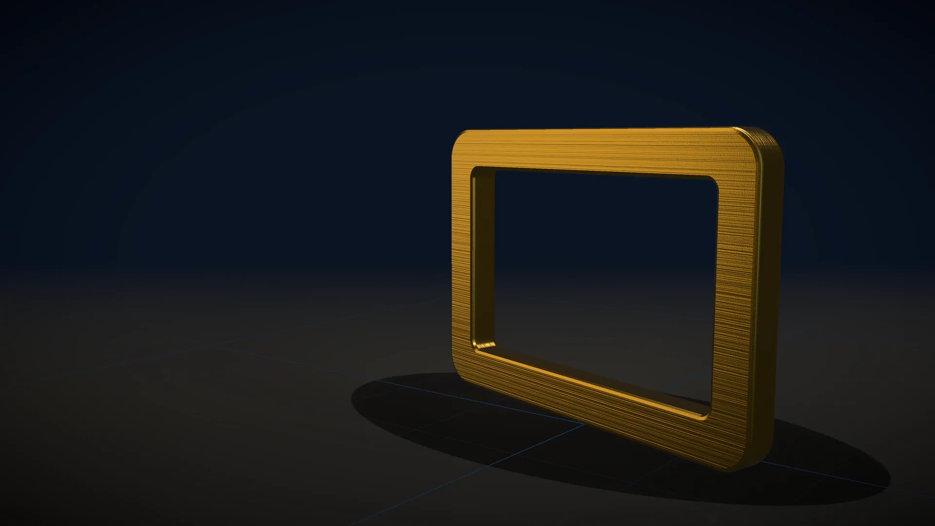 An upright bevelled brushed gold frame standing on a dark floor